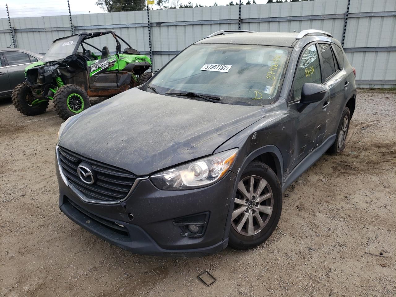 Photo 2 from auction – 2016 MAZDA UK with VIN JM3KE2CY4G0811602