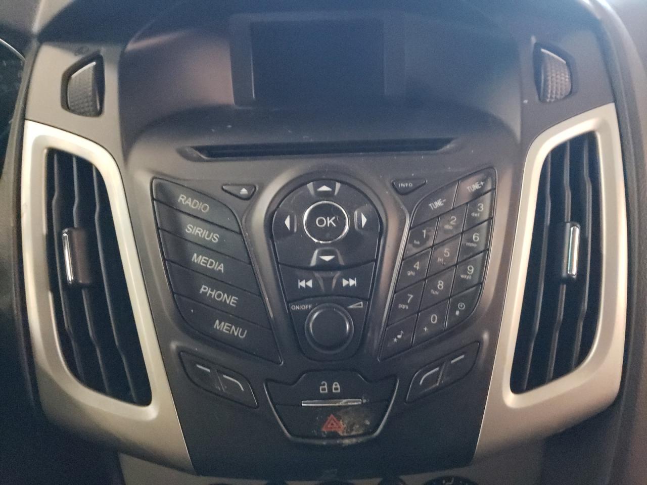 Photo 9 from auction – 2014 FORD FOCUS SE with VIN 1FADP3F23EL109748