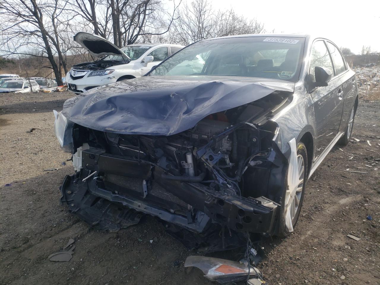 Photo 2 from auction – 2015 TOYOTA AVALON HYB with VIN 4T1BD1EB5FU035854