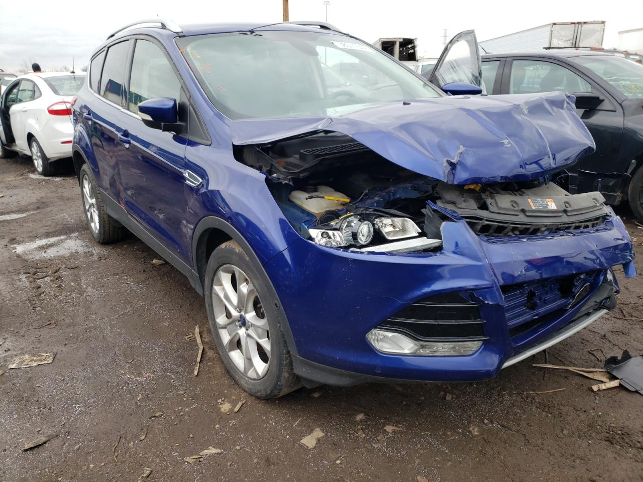 FORD ESCAPE TIT 2015 with VIN 1FMCU9JX2FUB03869 - Photo from auction