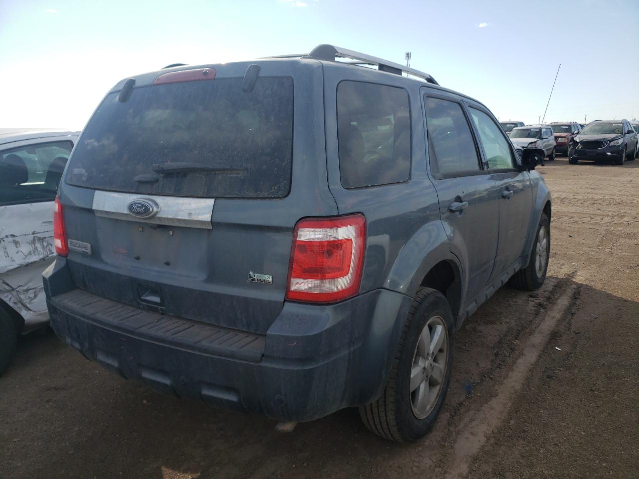 Photo 4 from auction – 2011 FORD ESCAPE LIM with VIN 1FMCU0EG5BKA81202
