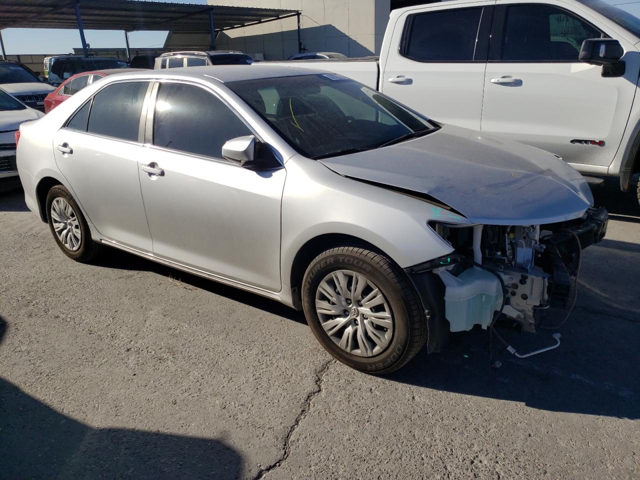 TOYOTA CAMRY L 2014 with VIN 4T4BF1FK1ER410636 - Photo from auction