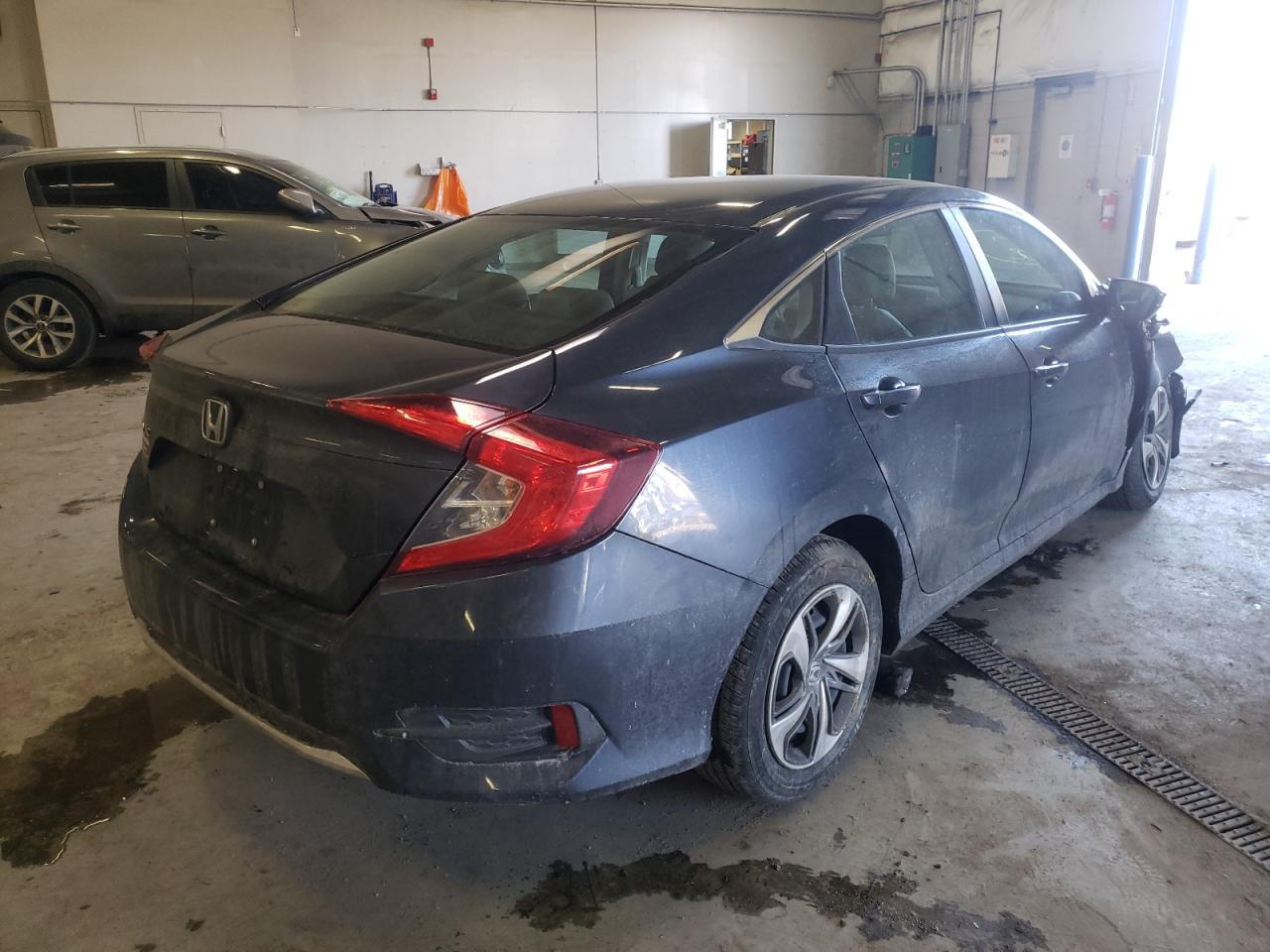 Photo 4 from auction – 2021 HONDA CIVIC LX with VIN 2HGFC2F68MH519938