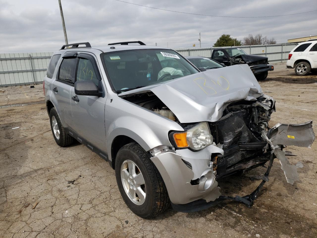 FORD ESCAPE XLT 2011 with VIN 1FMCU9D79BKB26034 - Photo from auction