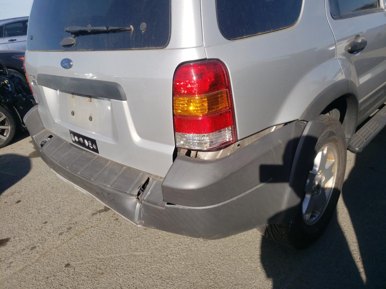 Photo 9 from auction – 2005 FORD ESCAPE XLT with VIN 1FMYU93145KB03400