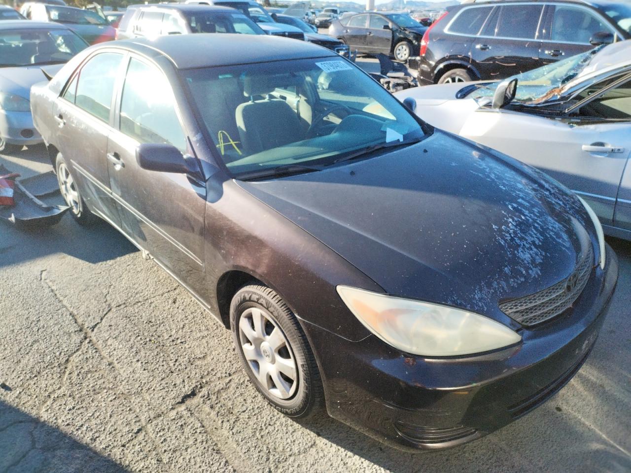 TOYOTA CAMRY LE 2002 with VIN 4T1BE32K52U588107 - Photo from auction
