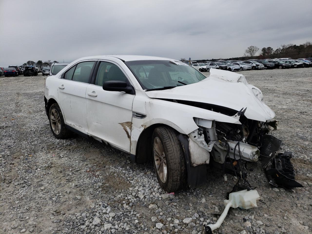 FORD TAURUS SE 2016 with VIN 1FAHP2D84GG146208 - Photo from auction