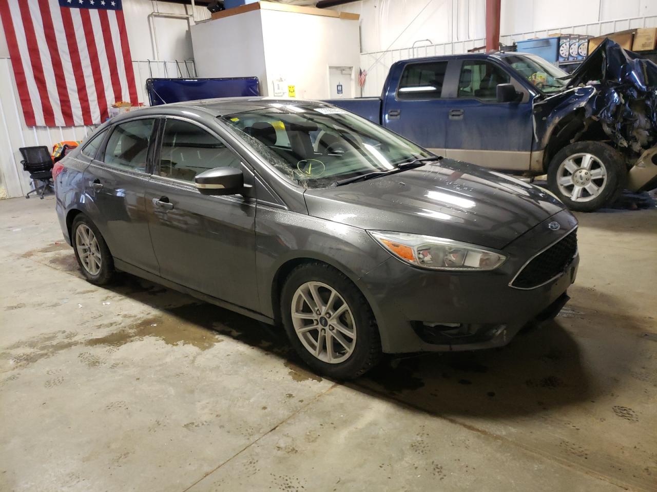 FORD FOCUS SE 2015 with VIN 1FADP3F22FL275762 - Photo from auction