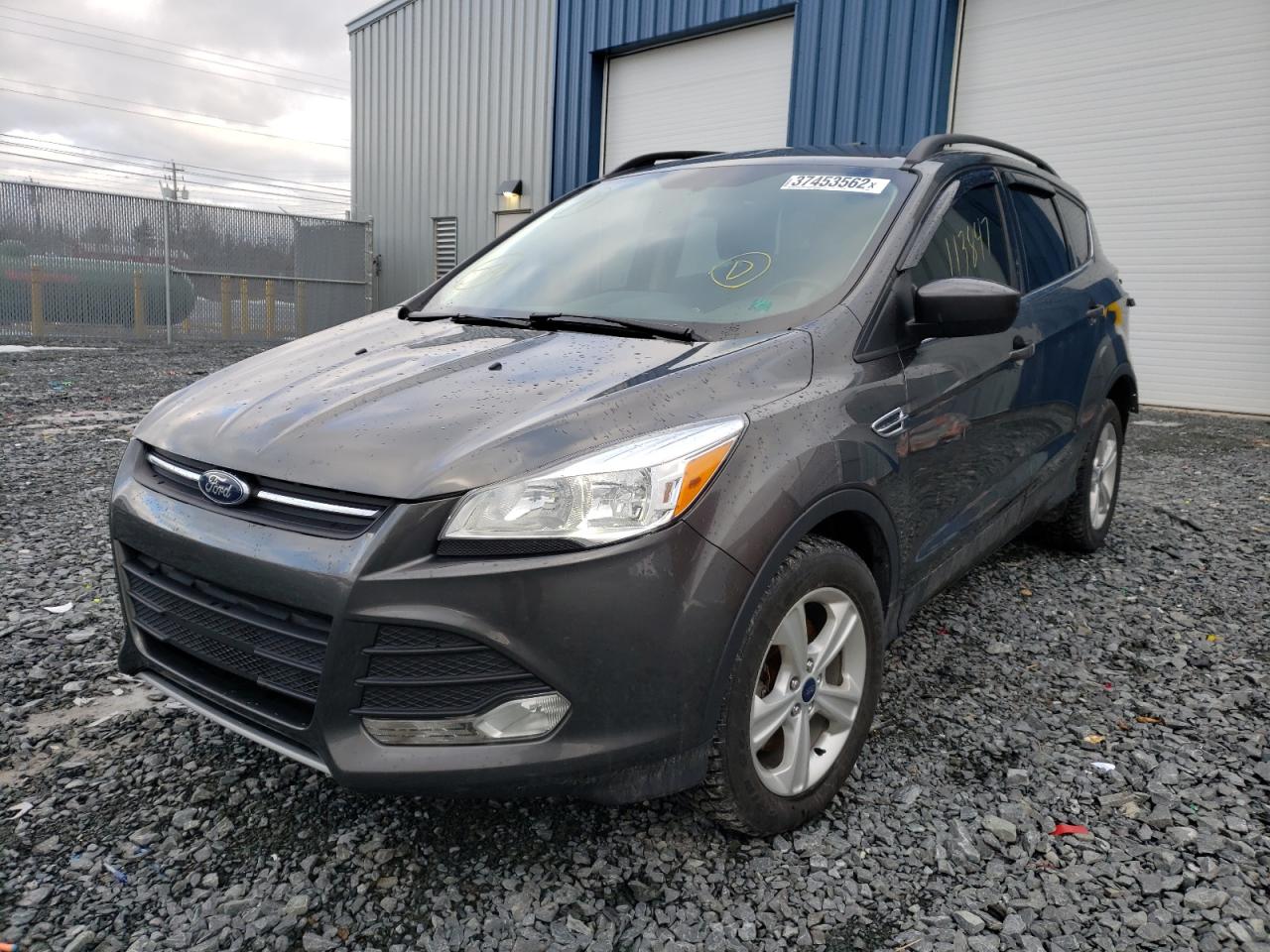 Photo 2 from auction – 2015 FORD ESCAPE SE with VIN 1FMCU9G90FUC83667
