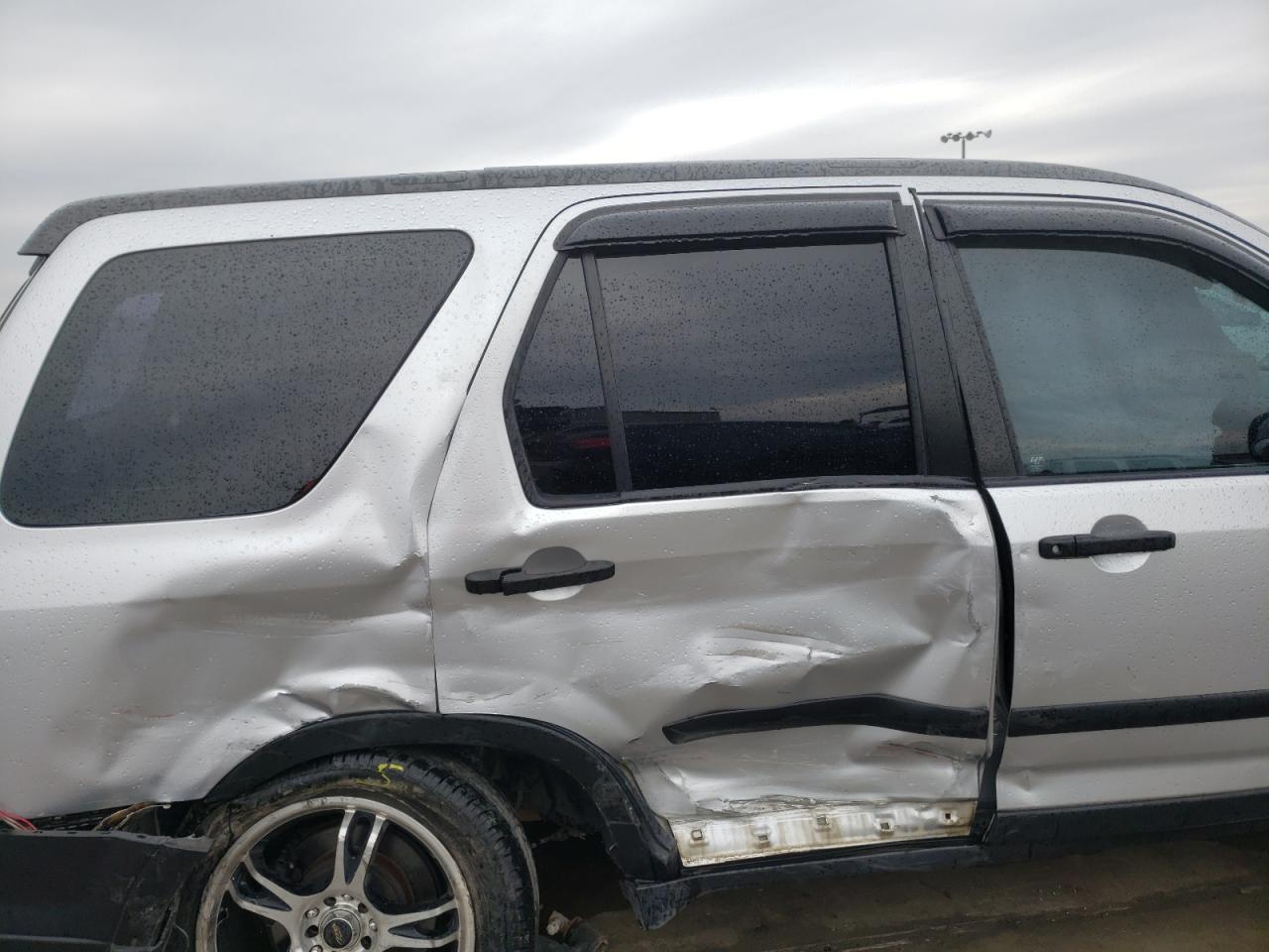 Photo 6 from auction – 2006 HONDA CR-V LX with VIN JHLRD68546C025380