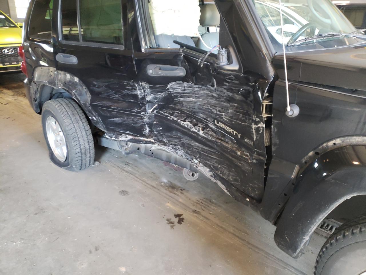 Photo 9 from auction – 2002 JEEP LIBERTY with VIN 1J8GL58K52W156729