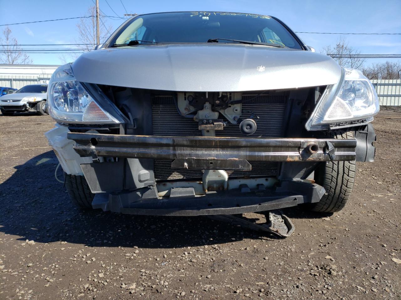Photo 9 from auction – 2011 NISSAN VERSA S with VIN 3N1BC1CPXBL405466