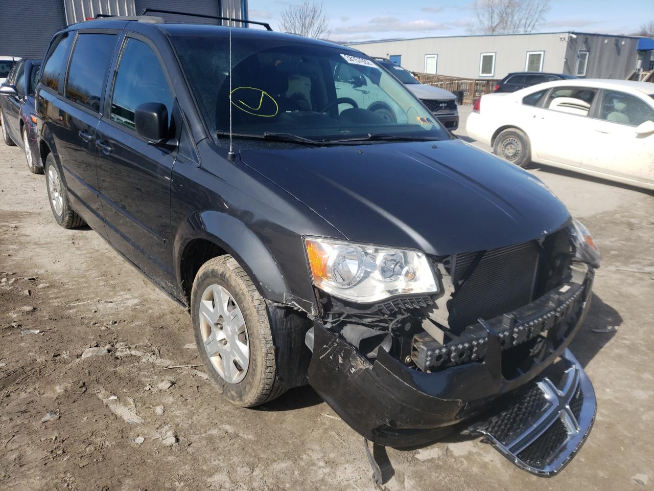DODGE GRAND CARA 2011 with VIN 2D4RN4DG2BR779033 - Photo from auction