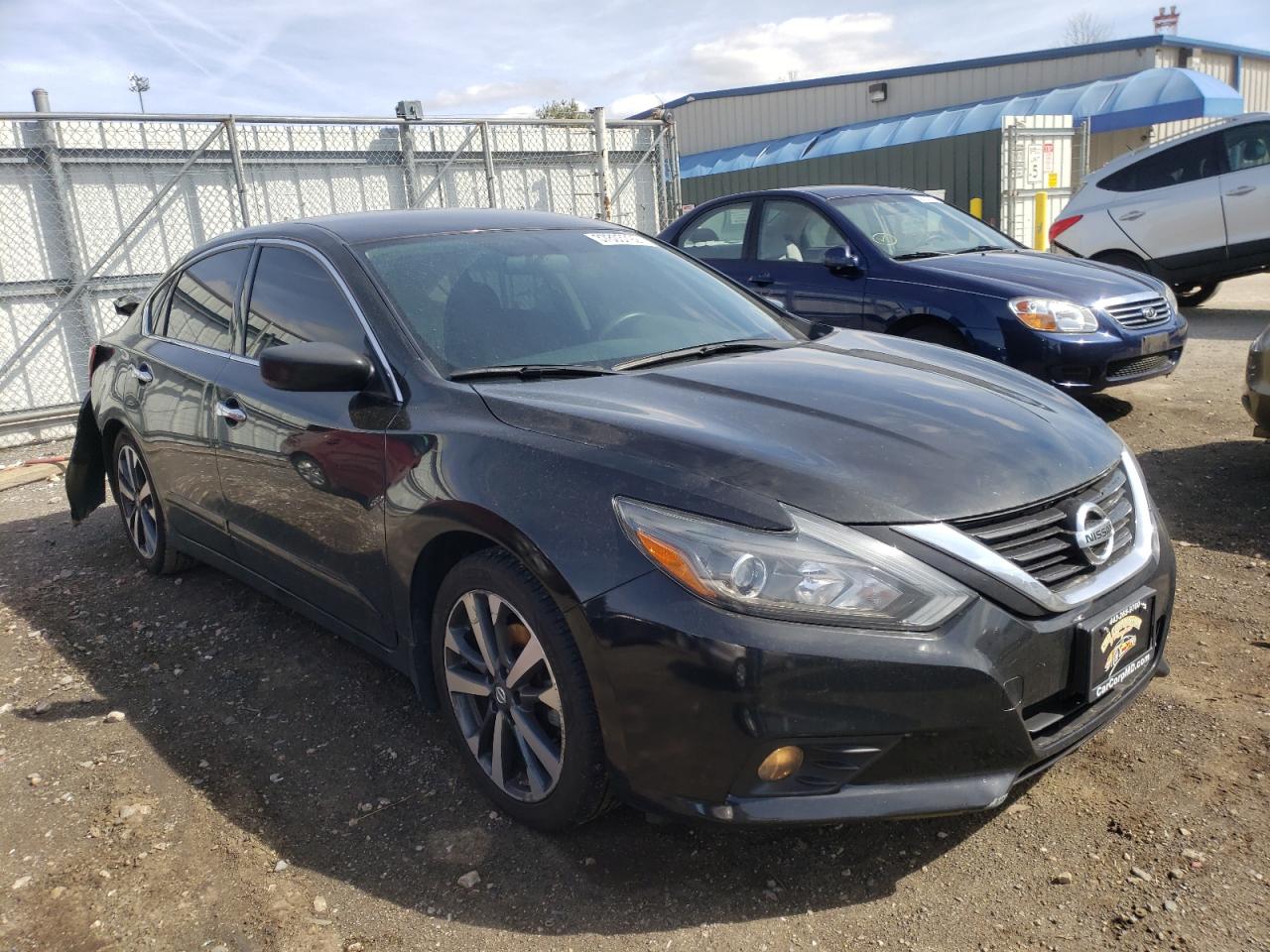 NISSAN ALTIMA 2.5 2017 with VIN 1N4AL3AP7HC472334 - Photo from auction