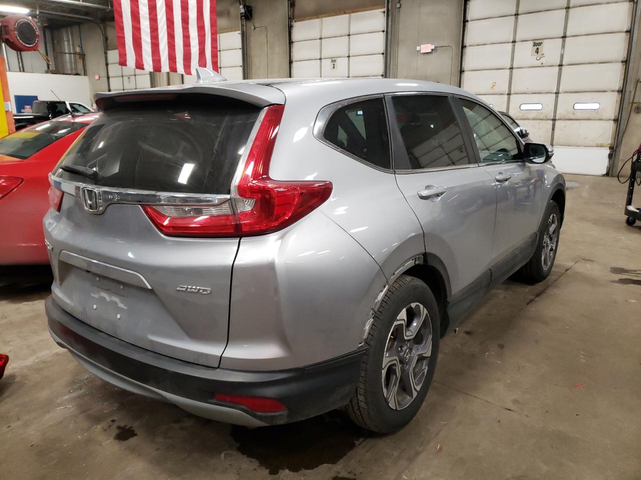 Photo 4 from auction – 2017 HONDA CR-V EX with VIN 5J6RW2H57HL046530