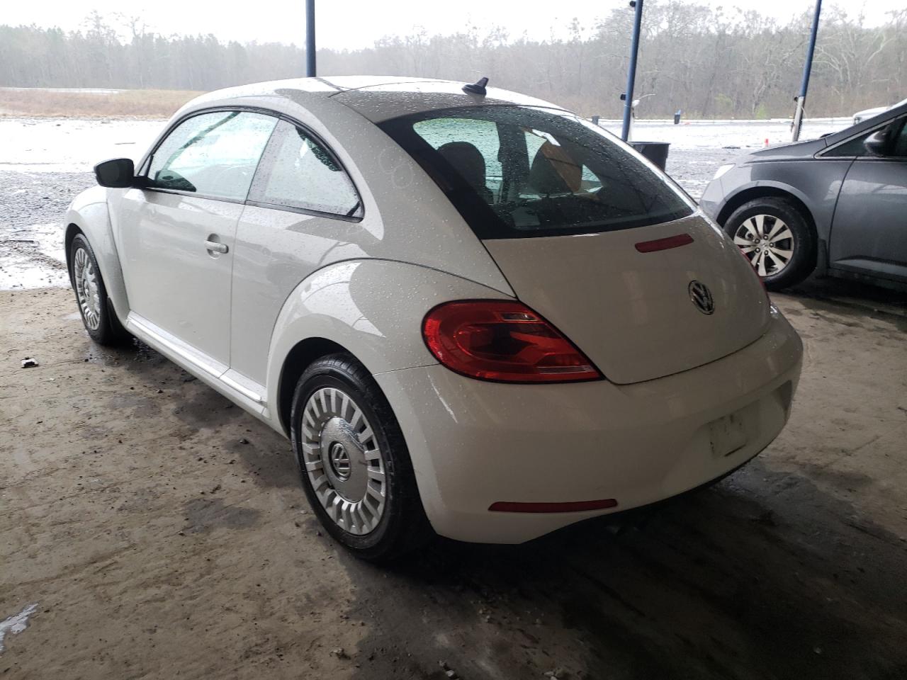 Photo 3 from auction – 2014 VOLKSWAGEN BEETLE with VIN 3VWJ17AT5EM633694