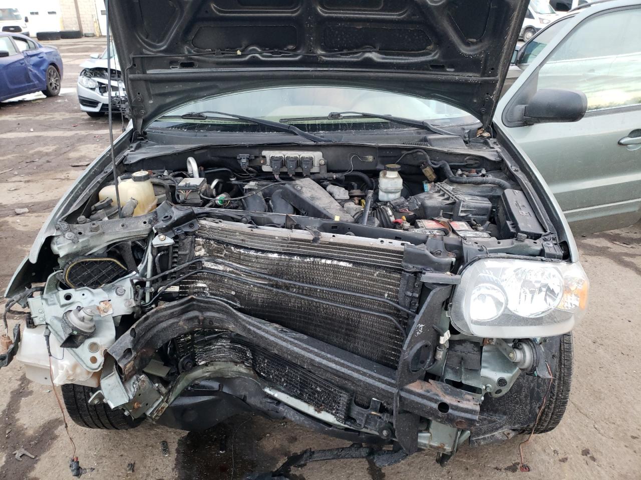 Photo 7 from auction – 2006 FORD ESCAPE LIM with VIN 1FMYU04176KA28249