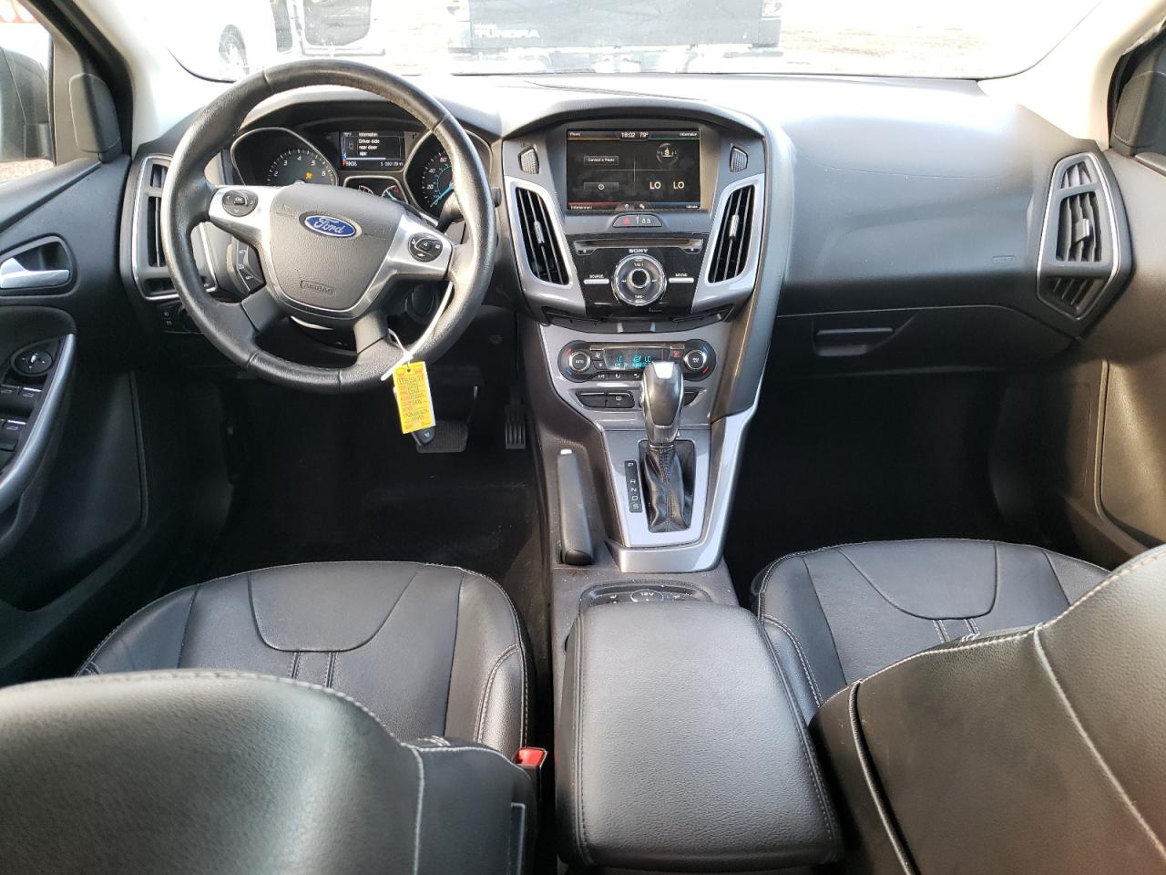 Photo 9 from auction – 2014 FORD FOCUS TITA with VIN 1FADP3J25EL352856