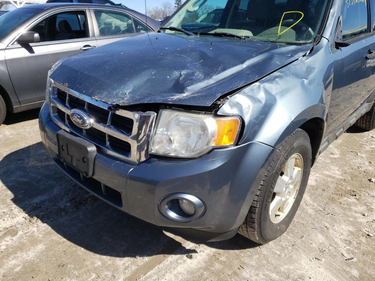 Photo 9 from auction – 2011 FORD ESCAPE XLT with VIN 1FMCU9D76BKA35979