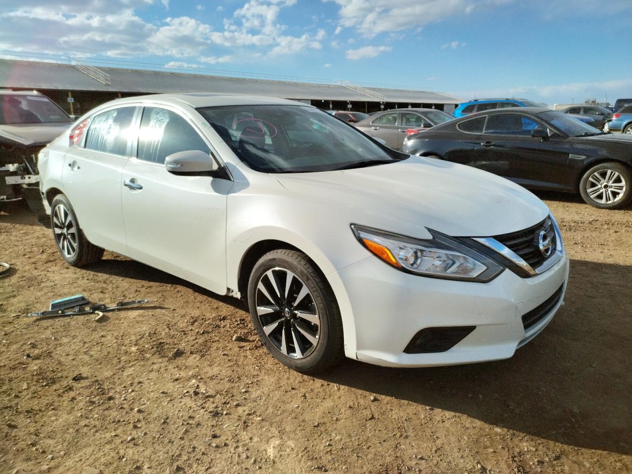 NISSAN ALTIMA 2.5 2018 with VIN 1N4AL3AP1JC140508 - Photo from auction