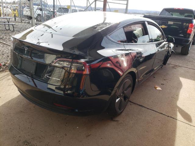 Photo 4 from auction – 2021 TESLA MODEL 3 with VIN 5YJ3E1EB3MF836696
