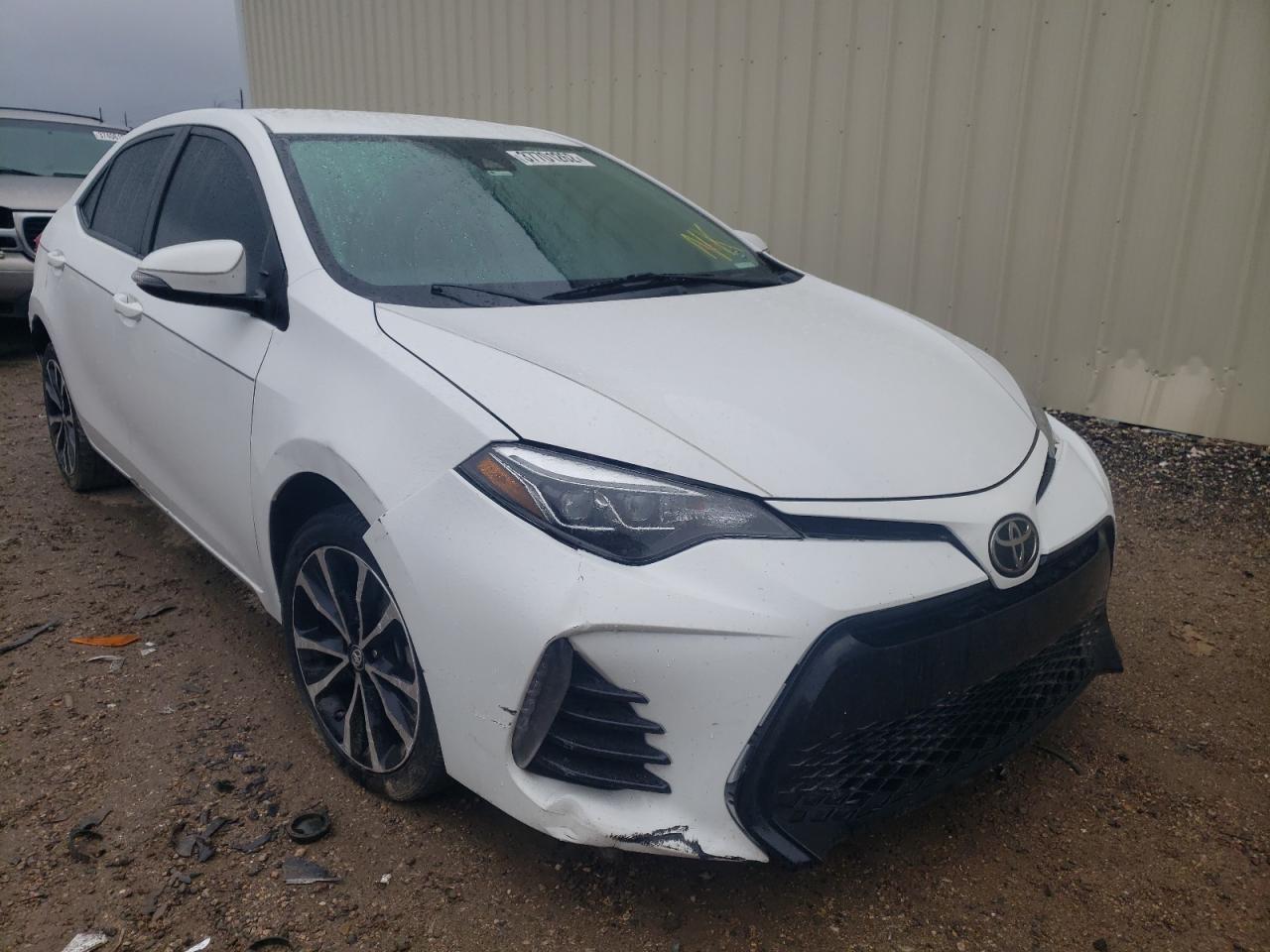 TOYOTA COROLLA L 2017 with VIN 5YFBURHE2HP731600 - Photo from auction