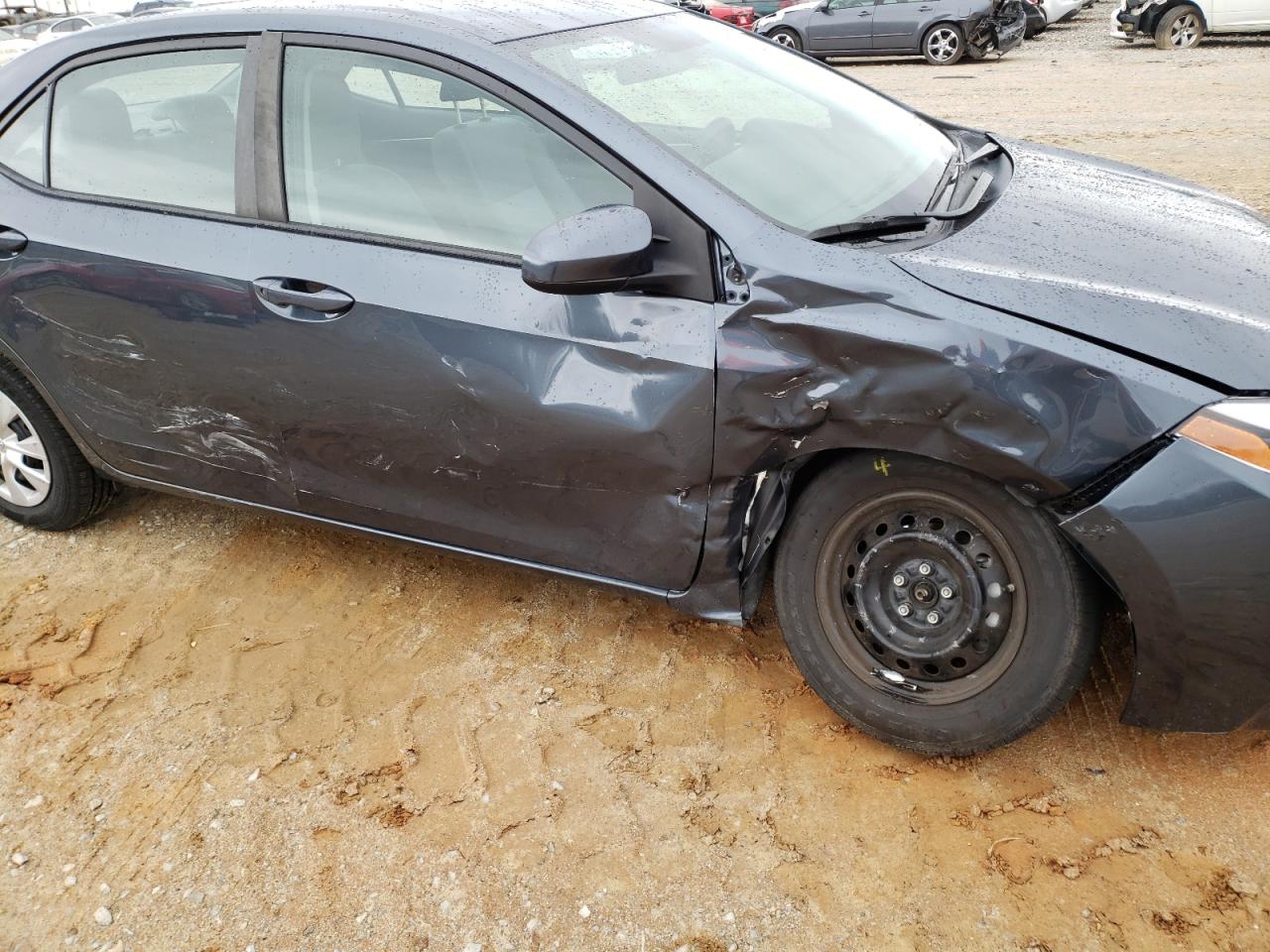 Photo 9 from auction – 2015 TOYOTA COROLLA L with VIN 2T1BURHE6FC295072