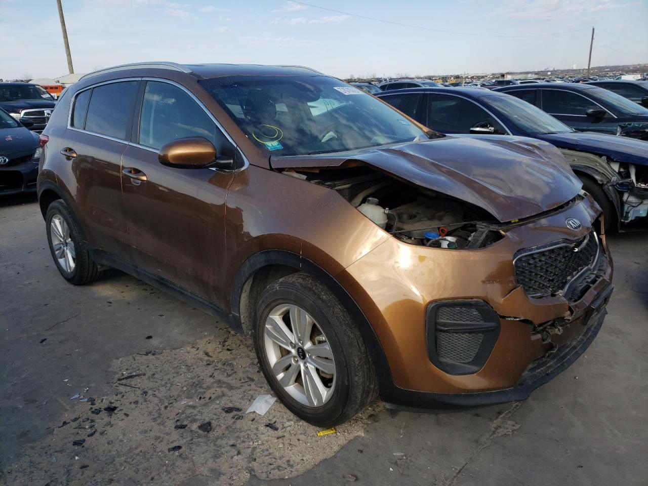 KIA SPORTAGE L 2017 with VIN KNDPM3AC0H7207634 - Photo from auction