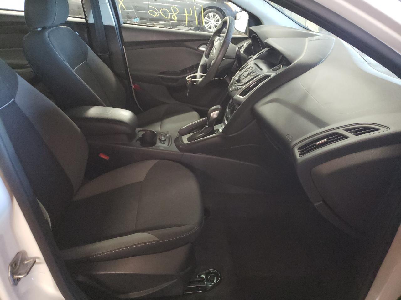 Photo 5 from auction – 2014 FORD FOCUS SE with VIN 1FADP3F23EL109748