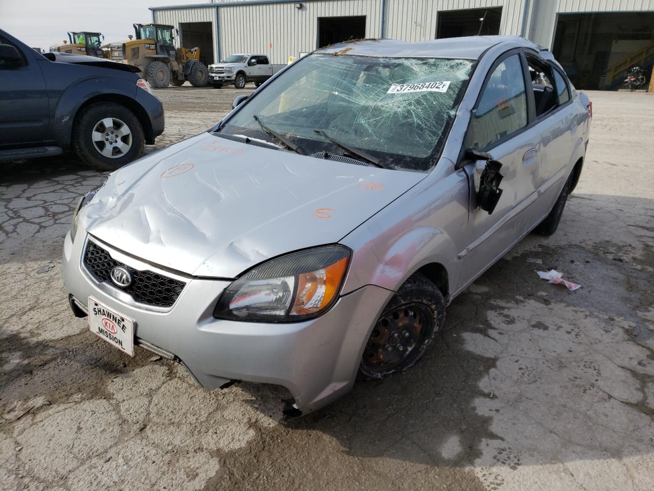 Photo 2 from auction – 2011 KIA RIO BASE with VIN KNADH4A36B6918455