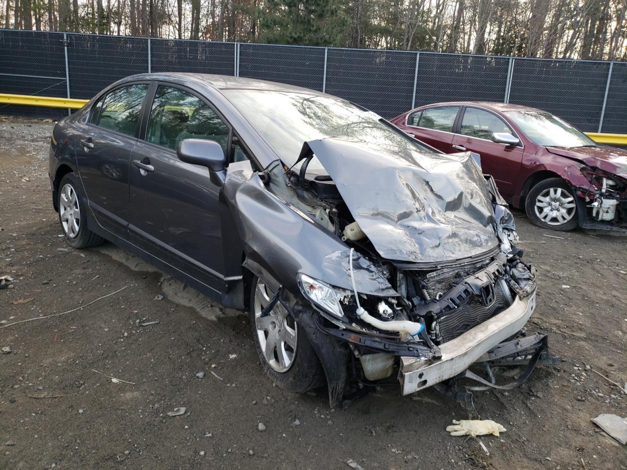 HONDA CIVIC LX 2011 with VIN 19XFA1F50BE036068 - Photo from auction