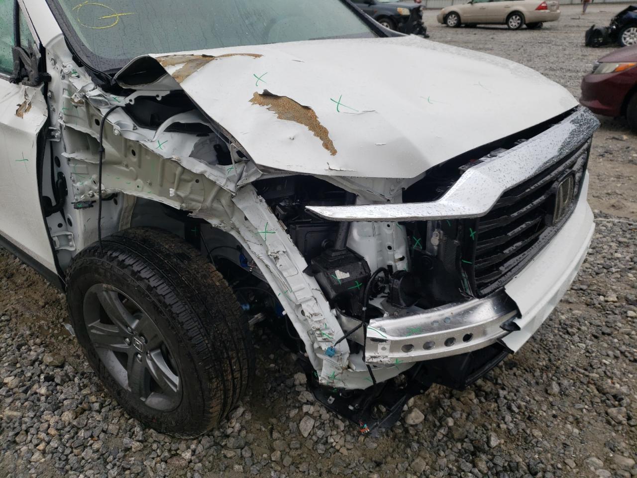 Photo 9 from auction – 2022 HONDA RIDGELINE with VIN 5FPYK3F71NB007204