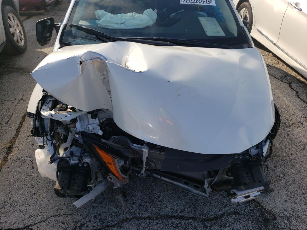 Photo 7 from auction – 2020 TOYOTA COROLLA LE with VIN JTDEPRAE9LJ020018