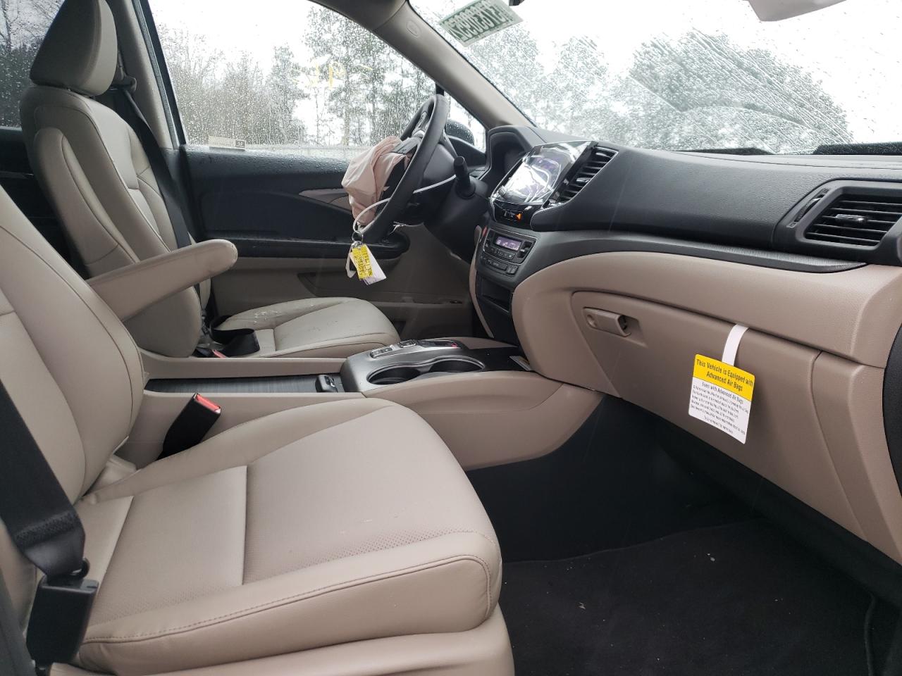 Photo 5 from auction – 2022 HONDA RIDGELINE with VIN 5FPYK3F71NB007204