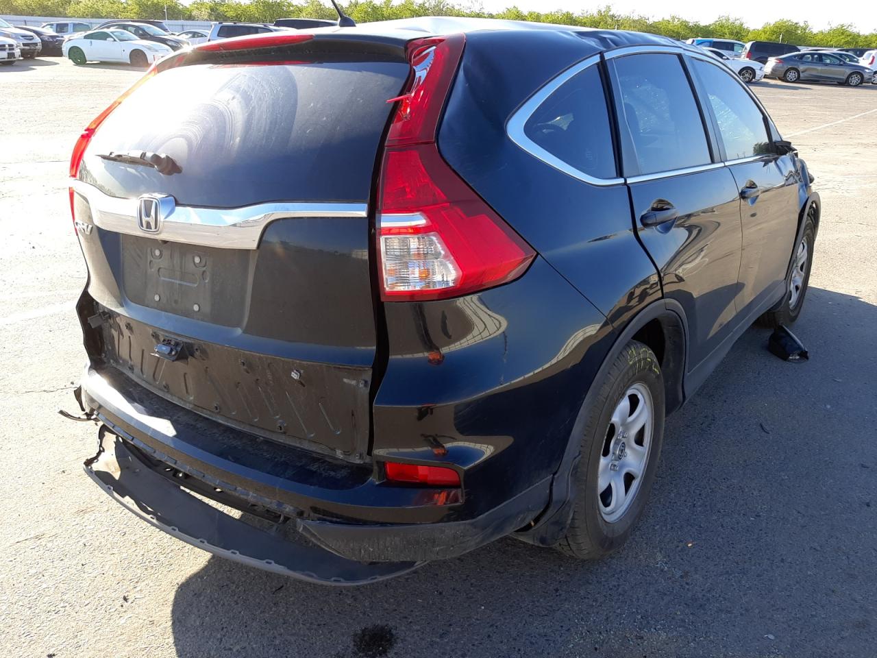 Photo 4 from auction – 2016 HONDA CR-V LX with VIN 2HKRM3H37GH504165