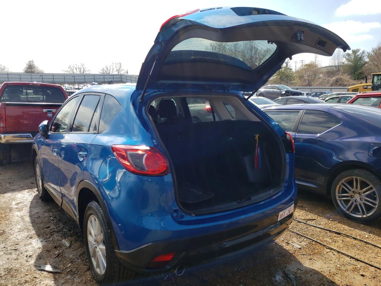 Photo 3 from auction – 2014 MAZDA CX-5 TOURI with VIN JM3KE2CY0E0310297