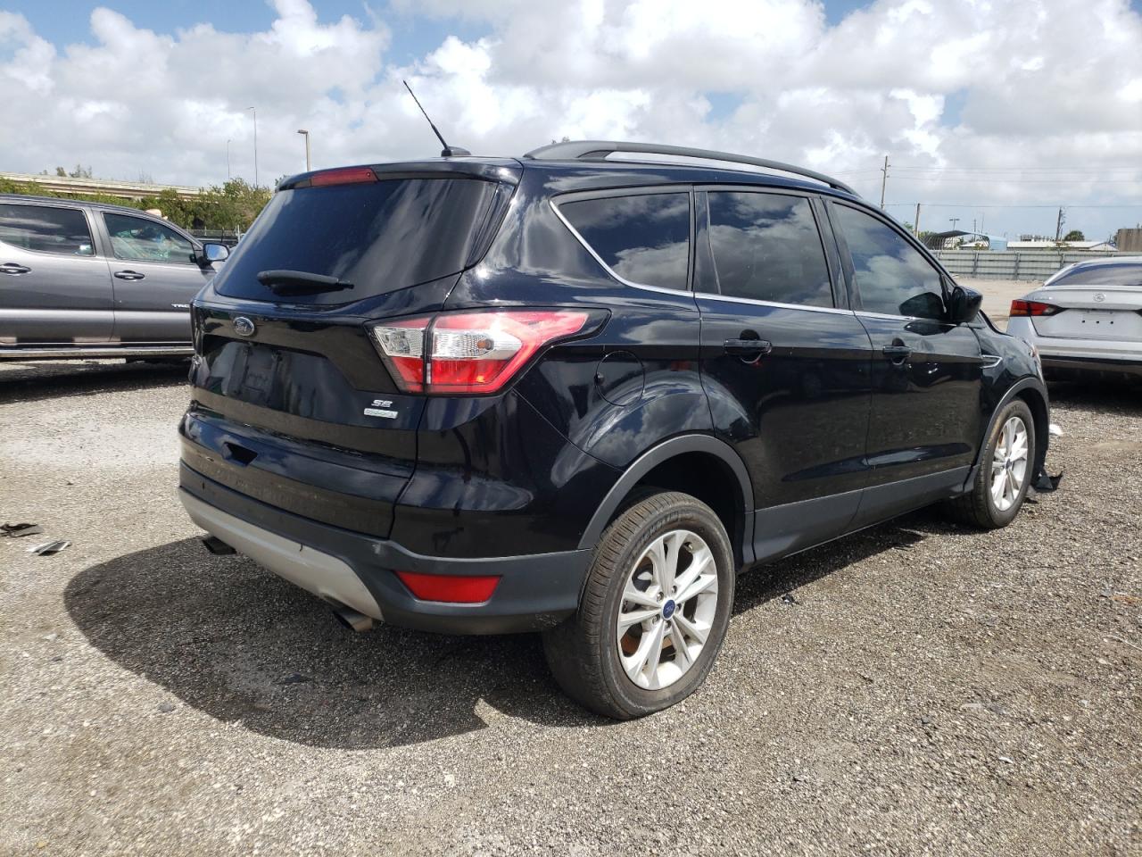 Photo 4 from auction – 2018 FORD ESCAPE SE with VIN 1FMCU0GD4JUA75252