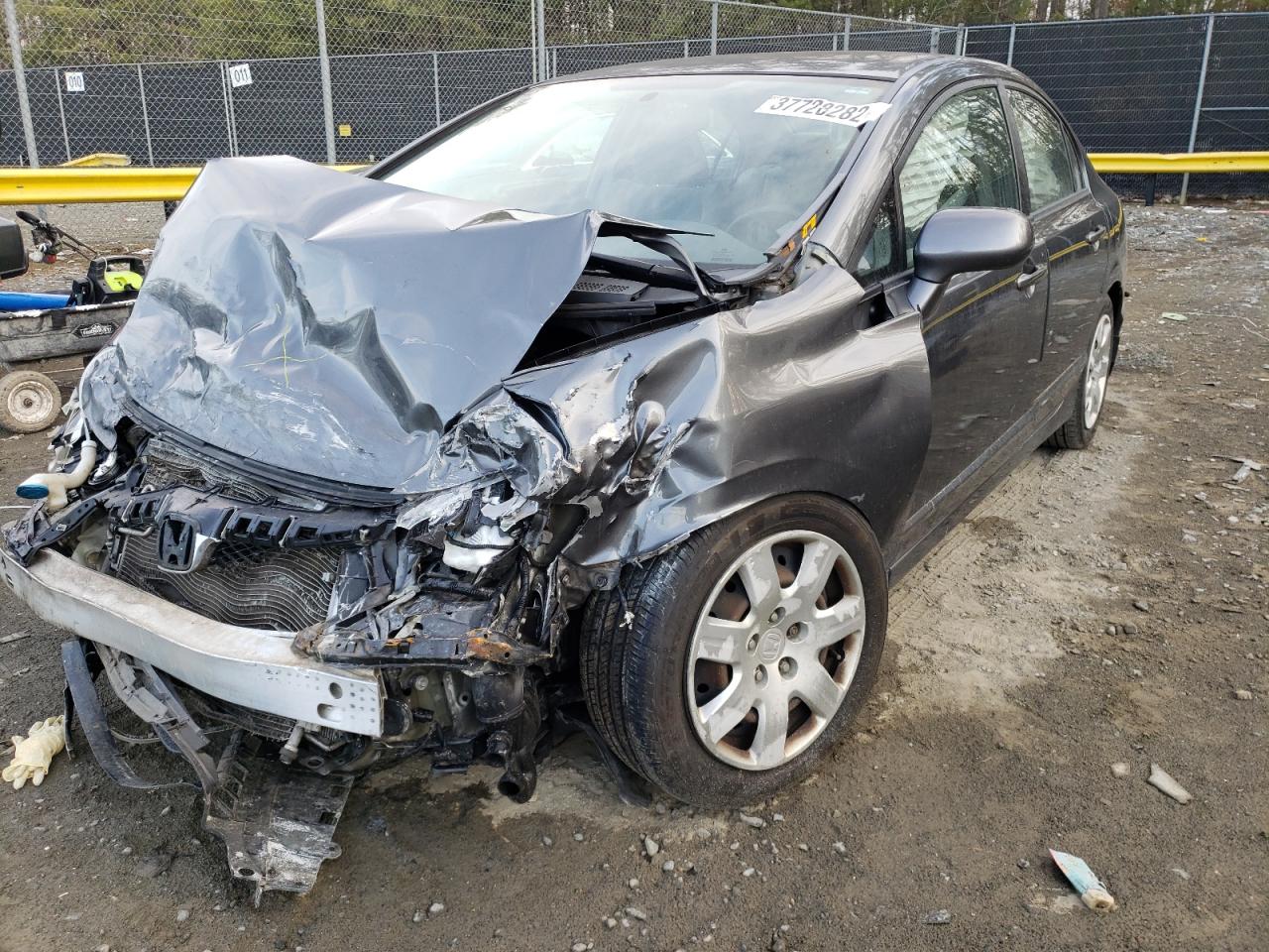 Photo 2 from auction – 2011 HONDA CIVIC LX with VIN 19XFA1F50BE036068