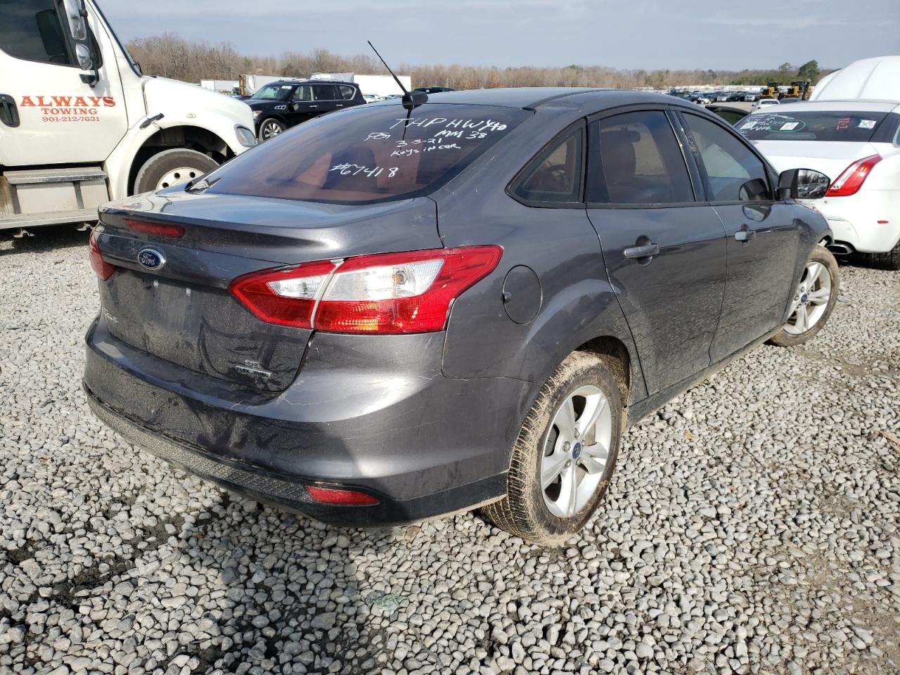 Photo 4 from auction – 2014 FORD FOCUS SE with VIN 1FADP3F2XEL419475