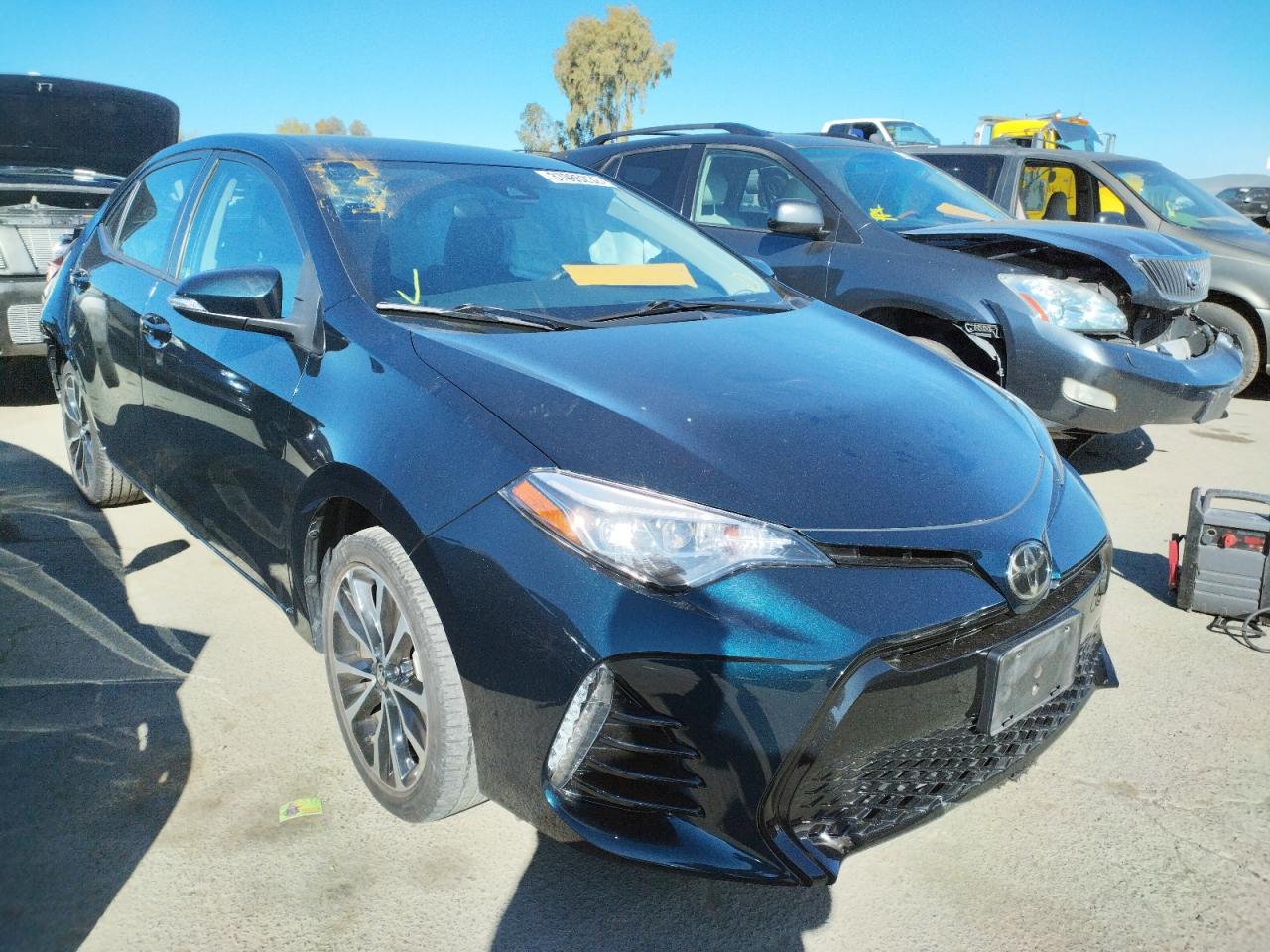 TOYOTA COROLLA L 2017 with VIN 5YFBURHE2HP663959 - Photo from auction