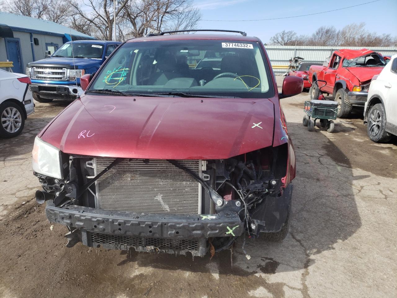 Photo 9 from auction – 2010 DODGE GRAND CARA with VIN 2D4RN6DX5AR425923