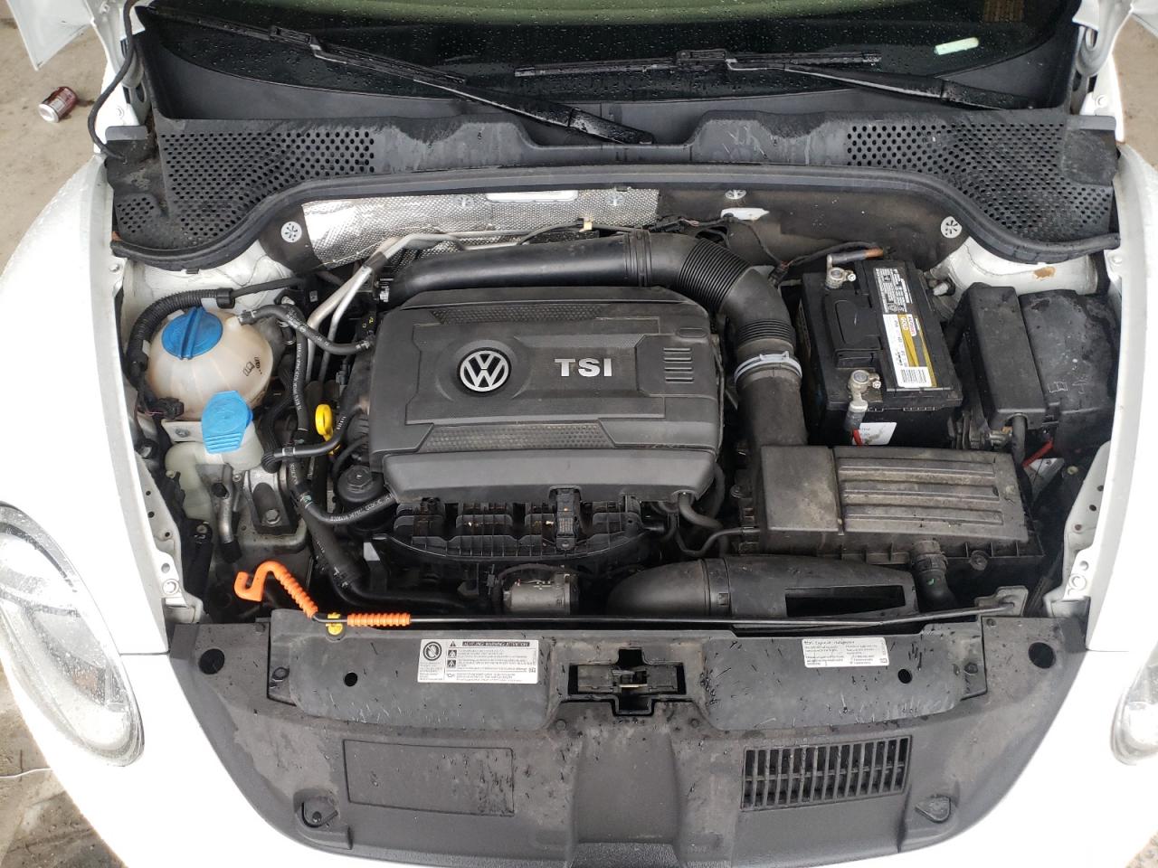 Photo 7 from auction – 2014 VOLKSWAGEN BEETLE with VIN 3VWJ17AT5EM633694