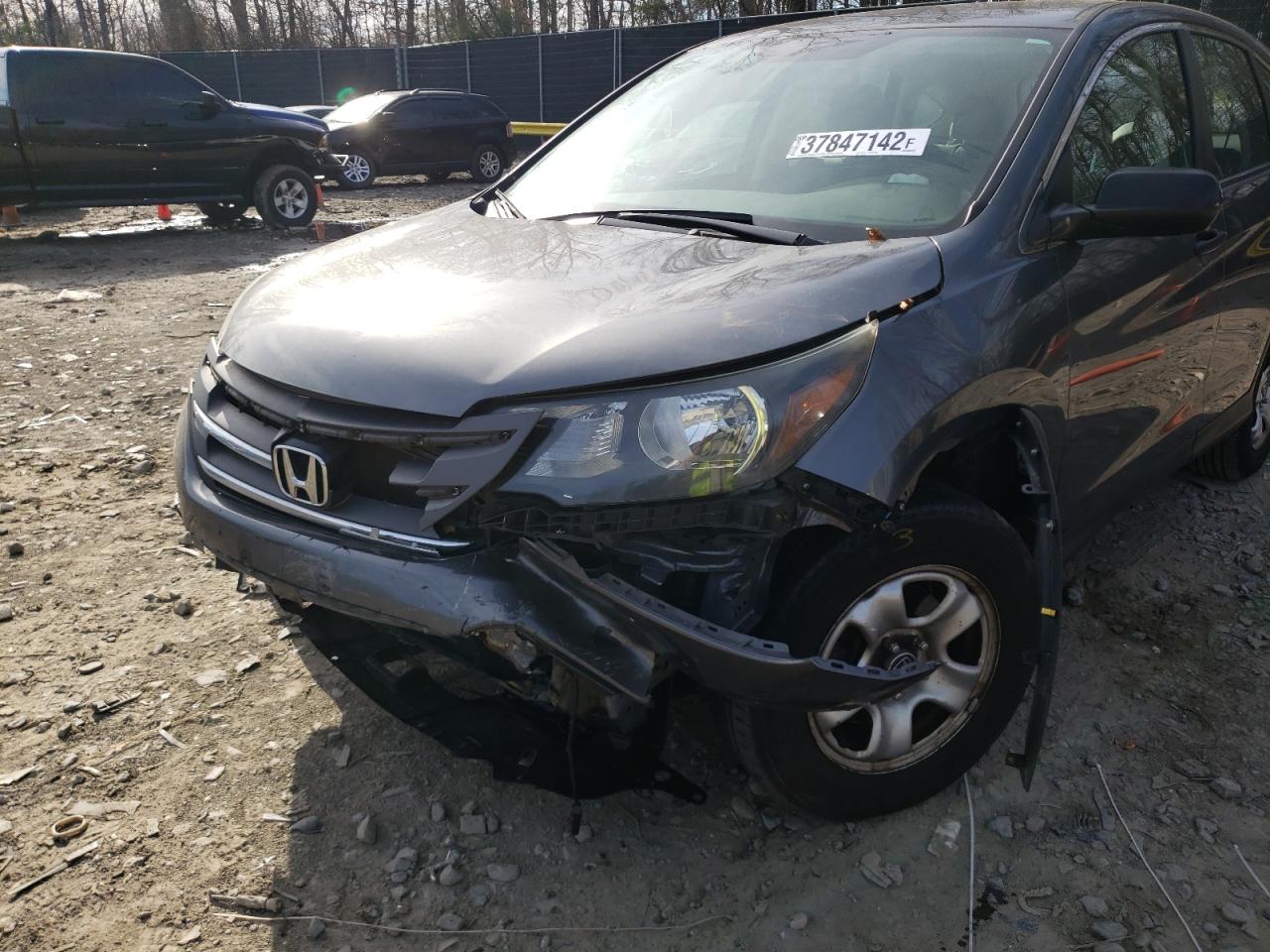 Photo 9 from auction – 2014 HONDA CR-V LX with VIN 3CZRM3H33EG703293