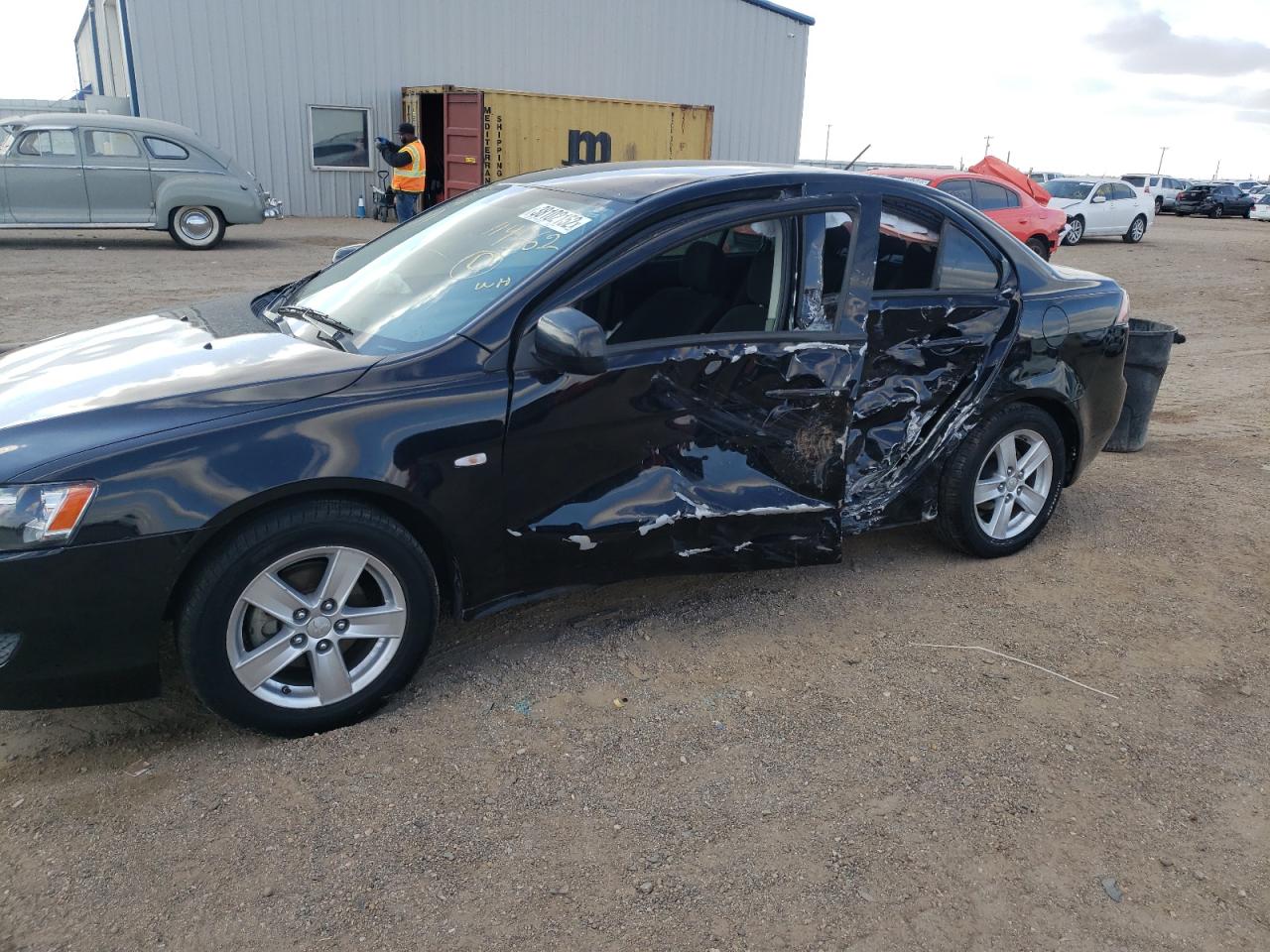 Photo 9 from auction – 2014 MITSUBISHI LANCER SE with VIN JA32V2FW3EU004902