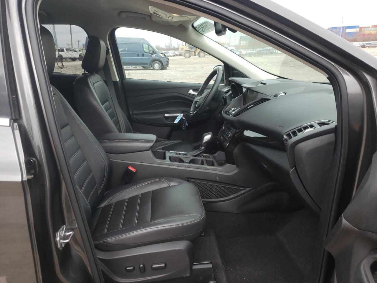 Photo 5 from auction – 2018 FORD ESCAPE TIT with VIN 1FMCU9J93JUB07892