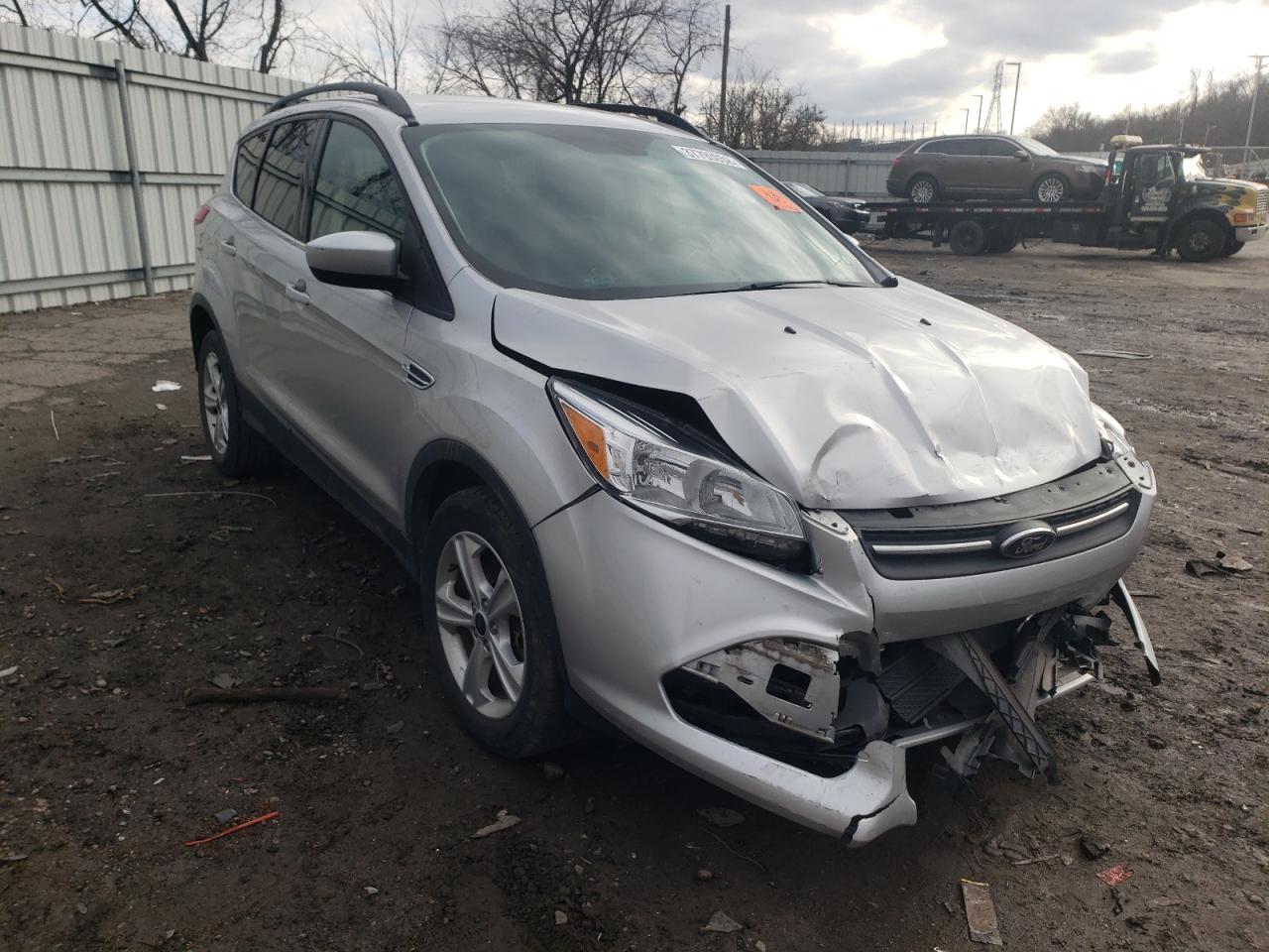 Photo 1 from auction – 2016 FORD ESCAPE SE with VIN 1FMCU9GX5GUB86464