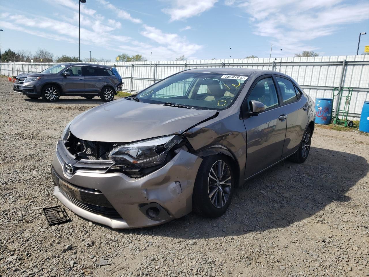 Photo 2 from auction – 2016 TOYOTA COROLLA L with VIN 5YFBURHE3GP377228