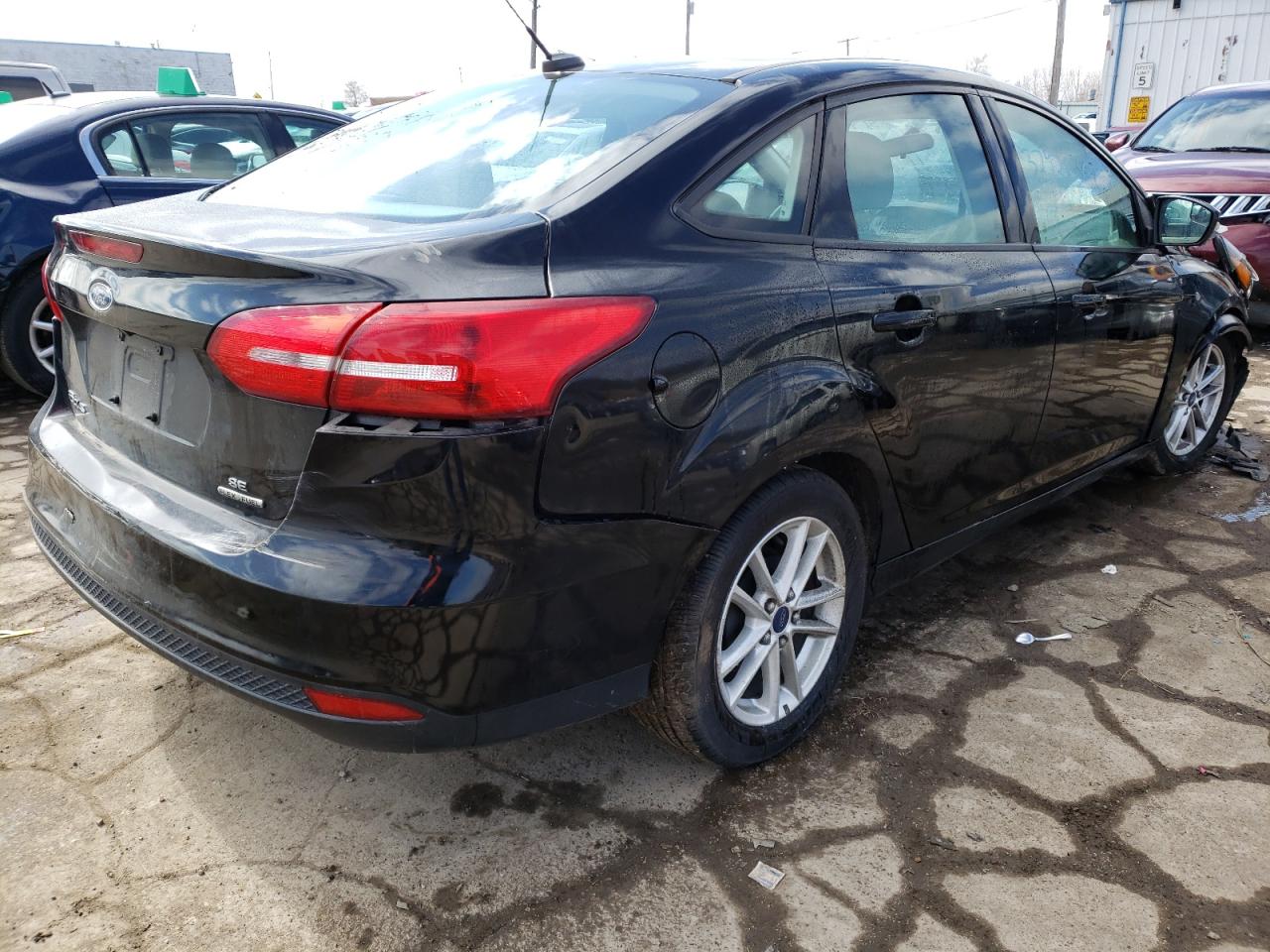 Photo 4 from auction – 2016 FORD FOCUS SE with VIN 1FADP3F28GL205636
