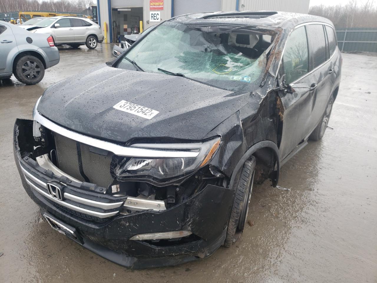 Photo 2 from auction – 2017 HONDA PILOT EXL with VIN 5FNYF6H58HB033703