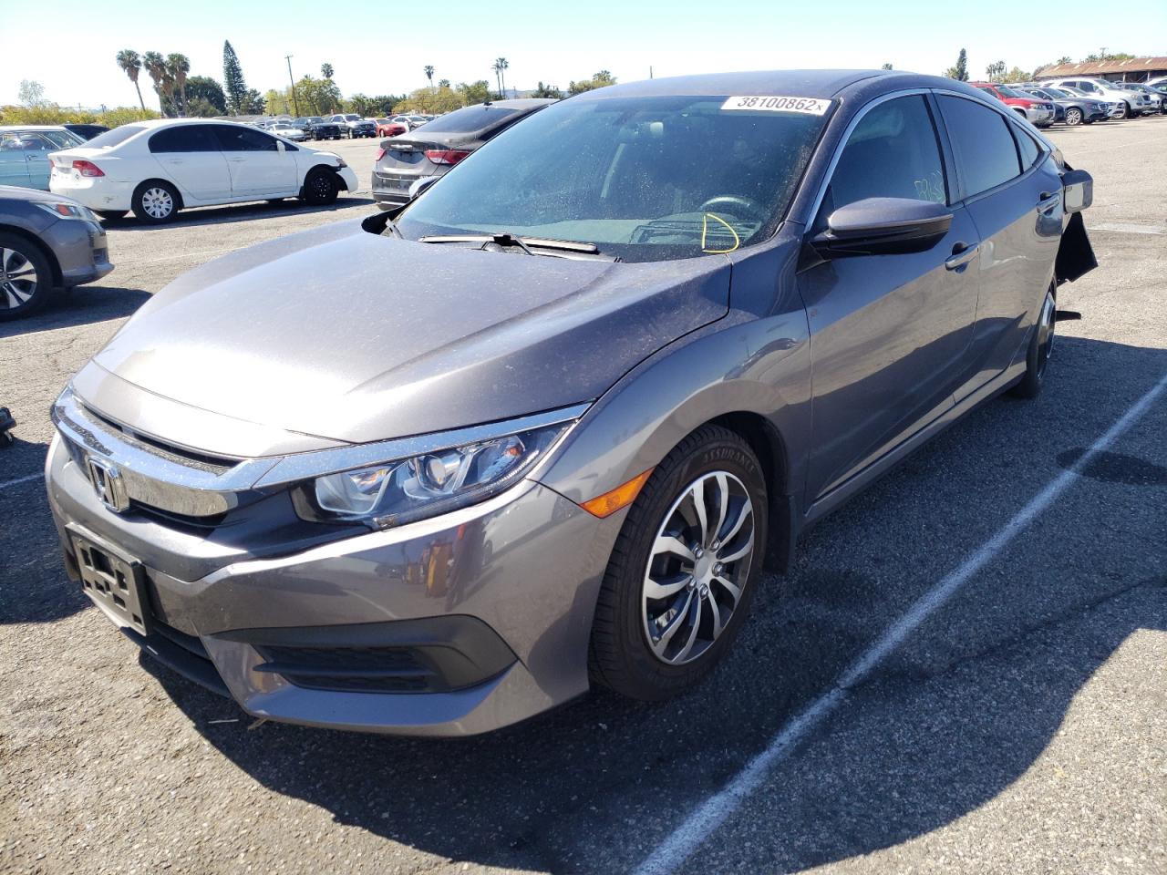 Фото 2 с аукциона – 2016 HONDA CIVIC LX с VIN 2HGFC2F55GH560880